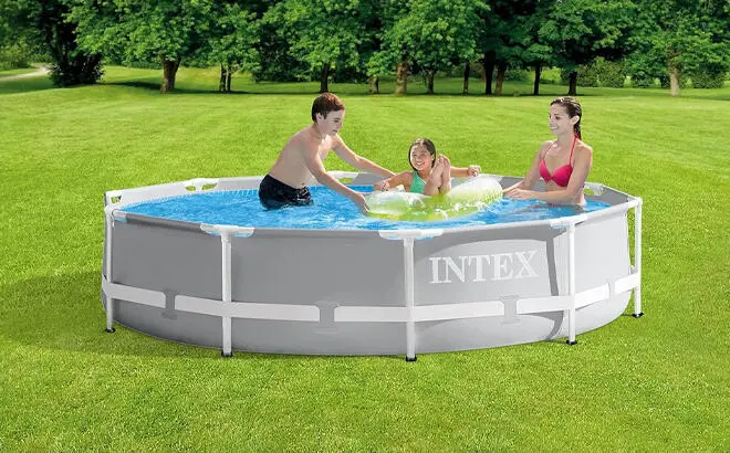 A Family Enjoying in the Intex Prism Frame Premium Above Ground Swimming Pool