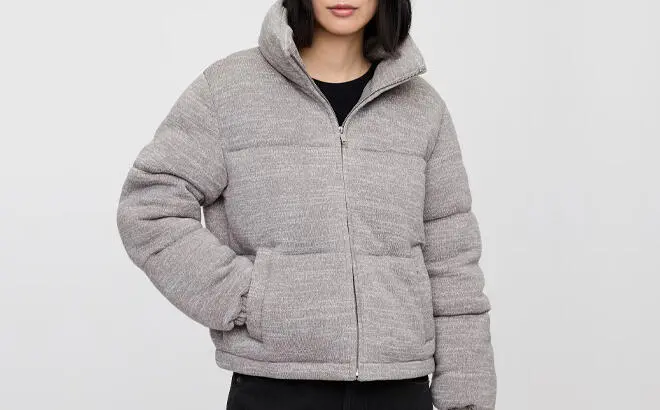 A Woman Wearing GAP Factory Relaxed Short Puffer Jacket