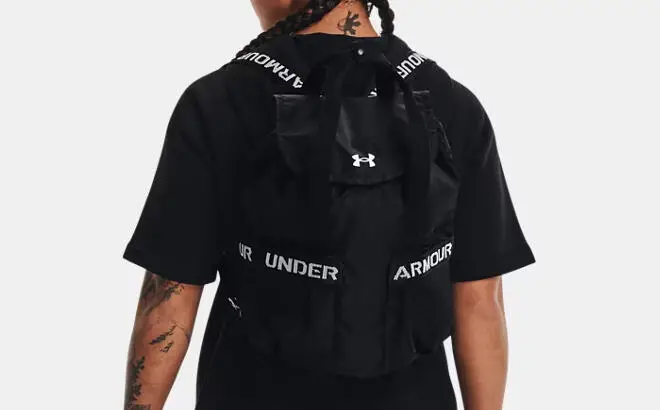A Person Carrying the Under Armour UA Favorites Backpack