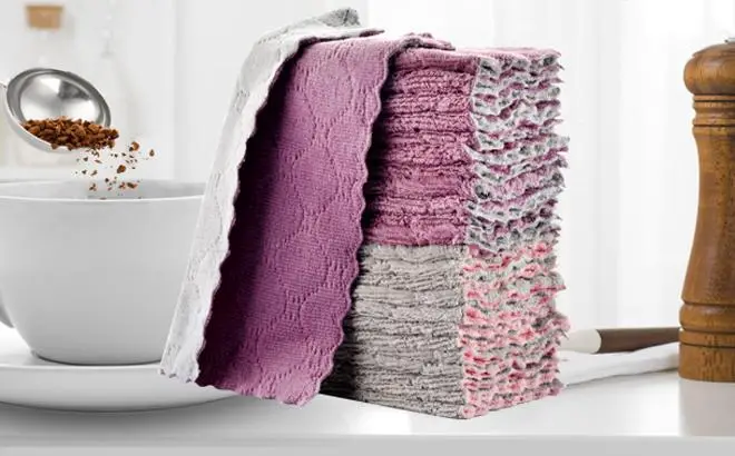OstWony Double Sided Multipurpose Reusable Kitchen Towels on a Table