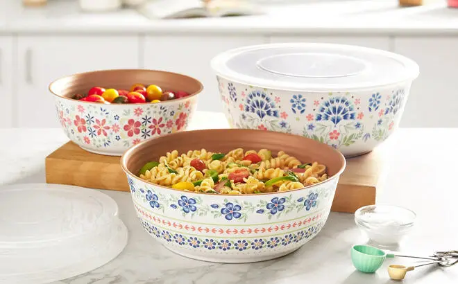 The Pioneer Woman Hattie 6 Piece Bamboo Melamine Bowl Set with Lids on the Kitchen Table