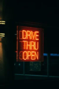 close up view of neon drivethru sign