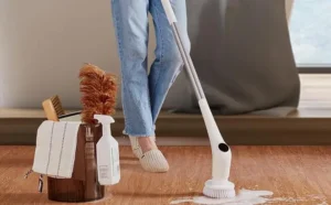 A Woman Cleaning Hardwood Floors with FUNCCUBE Electric Spin Scrubber