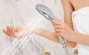 A Person holding a Dakings High Pressure 6 Spray Mode Shower Head